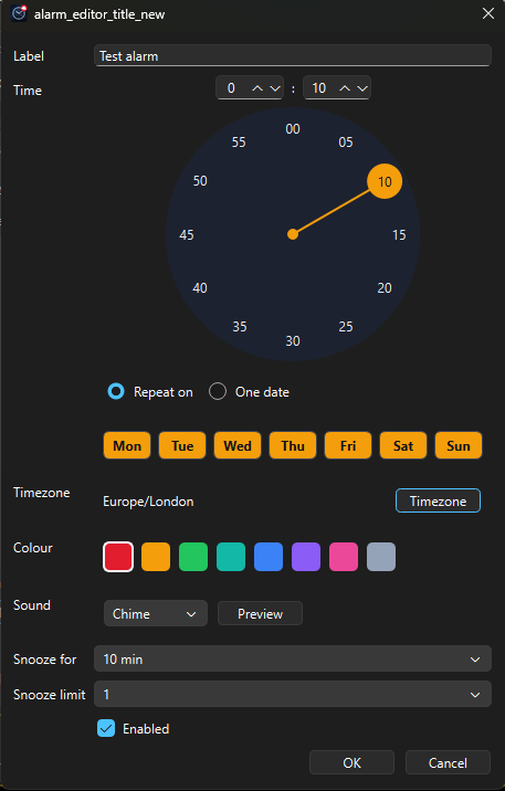 The Fancy Clock alarm editor with a clock-face time picker, weekday chips and colour swatches